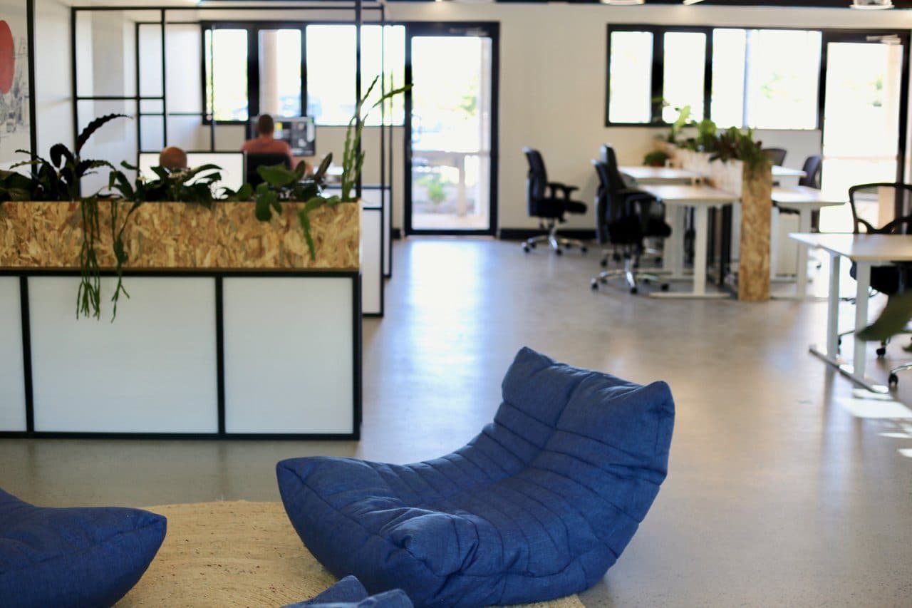 Desks and lounge seating in the coworking area of the Peregian Digital Hub